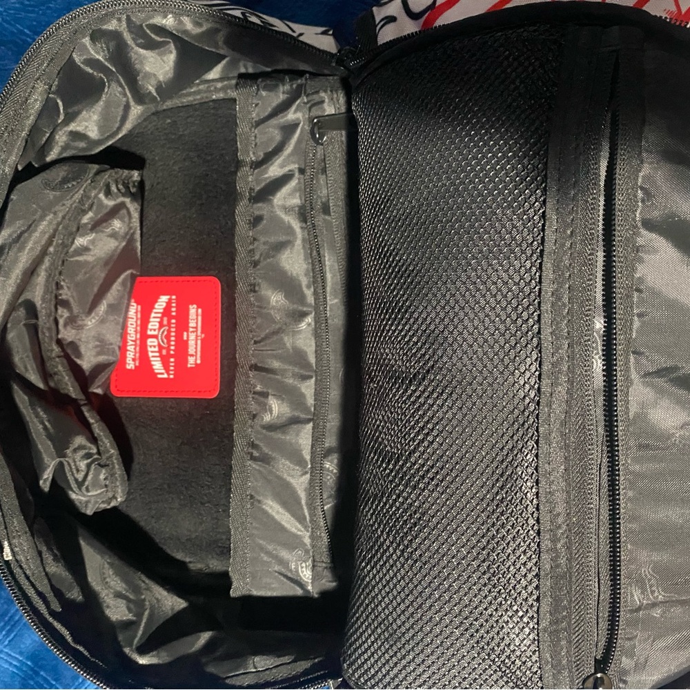 Sprayground Black and Red Graphic Skull Backpack - Picture 3 of 5